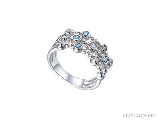Modern three-row design Blue Topaz and CZ Ring